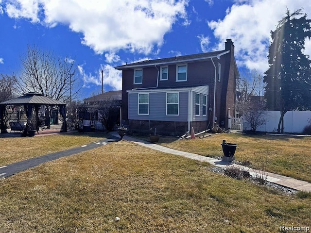 664 Buckingham Ave, Lincoln Park, MI 48146 - traditional-style home featuring a gazebo, a chimney, and brick siding