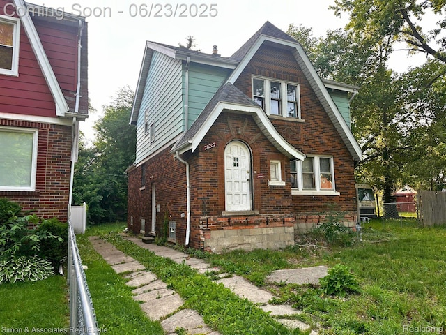 20203 Hull St, Detroit, MI 48203 - tudor home featuring brick siding