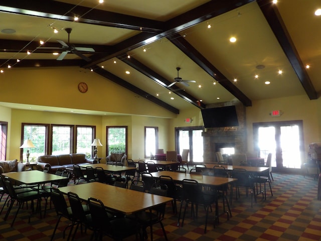 1246 Sunnyside Dr, Cadillac, MI 49601 - dining area with a ceiling fan, beam ceiling, carpet, high vaulted ceiling, and recessed lighting