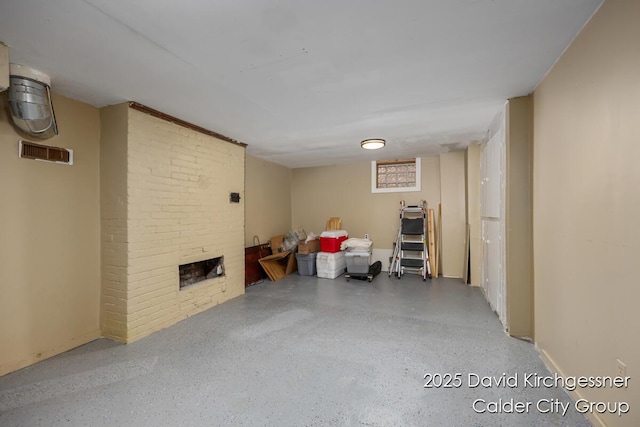 1328 Bemis St SE, Grand Rapids, MI 49506 - finished basement with a brick fireplace