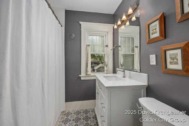 1328 Bemis St SE, Grand Rapids, MI 49506 - bathroom featuring vanity and tile patterned floors
