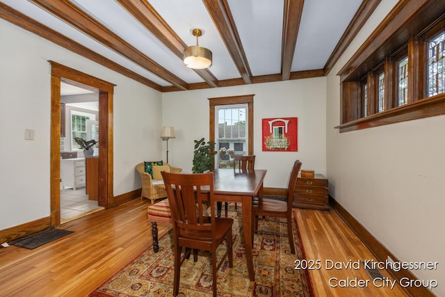 1328 Bemis St SE, Grand Rapids, MI 49506 - dining area featuring wood finished floors and beamed ceiling