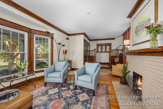 1328 Bemis St SE, Grand Rapids, MI 49506 - living room featuring crown molding, wood finished floors, and a fireplace