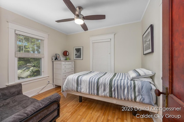 1328 Bemis St SE, Grand Rapids, MI 49506 - bedroom with hardwood / wood-style flooring, ornamental molding, and ceiling fan