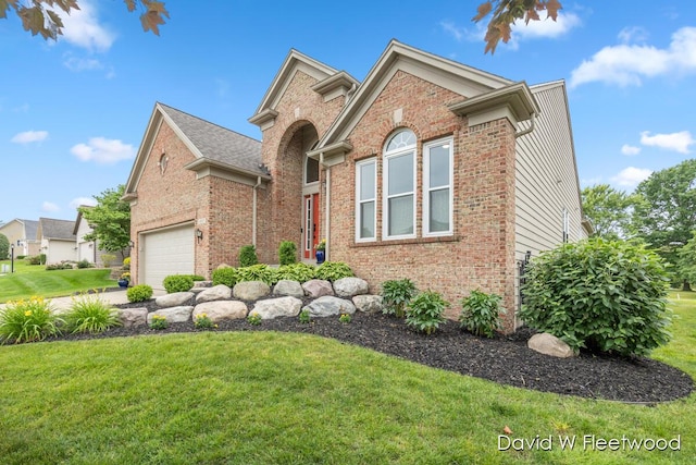 6935 Fairway Vista Dr SE, Caledonia, MI 49316 - traditional home featuring brick siding and a front yard