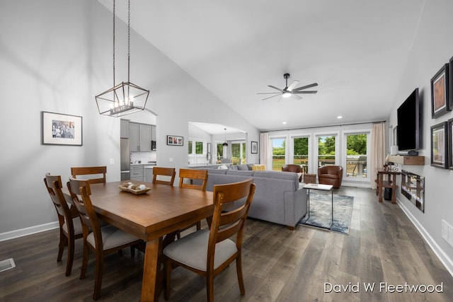 6935 Fairway Vista Dr SE, Caledonia, MI 49316 - dining area featuring high vaulted ceiling, dark wood-style flooring, a ceiling fan, and recessed lighting