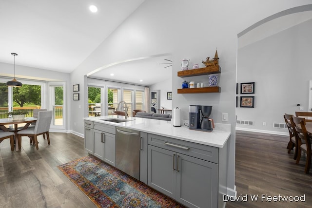 6935 Fairway Vista Dr SE, Caledonia, MI 49316 - kitchen featuring gray cabinets, dishwasher, recessed lighting, dark wood-type flooring, and high vaulted ceiling