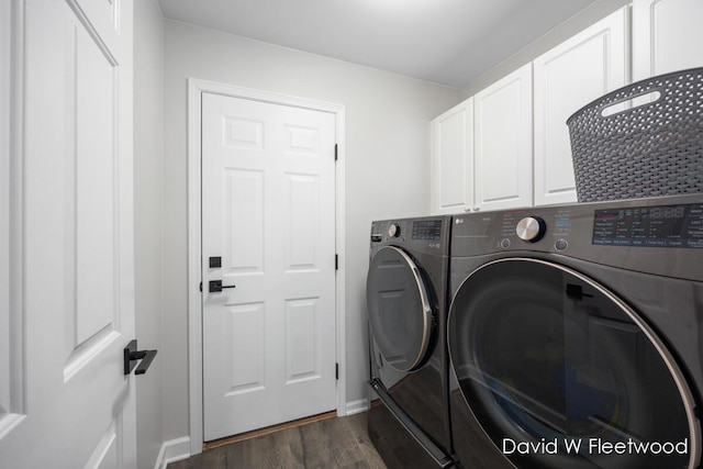 6935 Fairway Vista Dr SE, Caledonia, MI 49316 - laundry room with separate washer and dryer, cabinet space, and dark wood-style floors