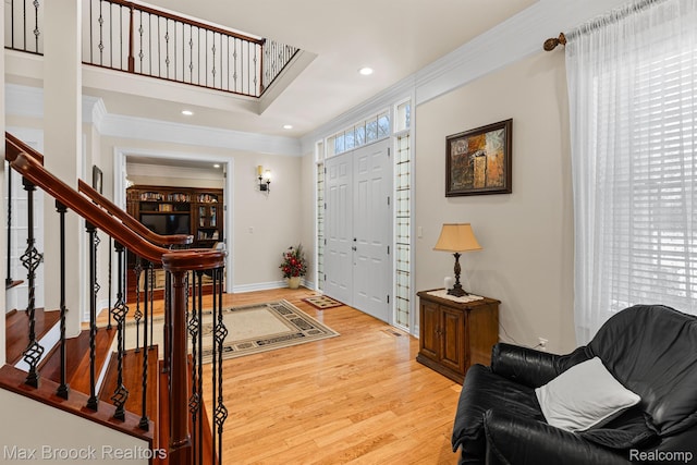 5626 Shadow Ln, Bloomfield Hills, MI 48302 - entrance foyer with light wood-type flooring, stairs, ornamental molding, and recessed lighting
