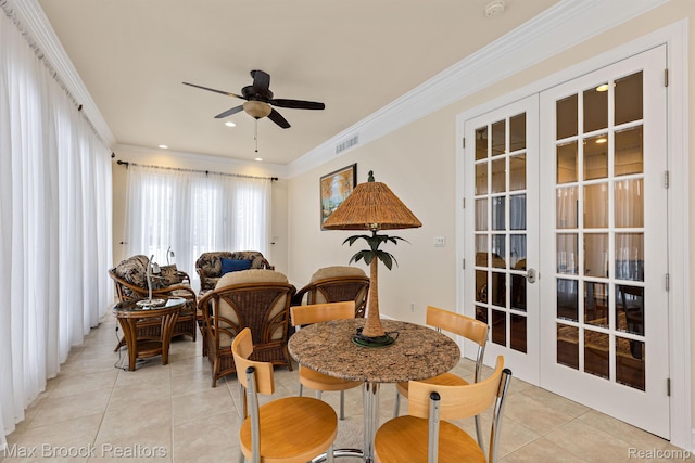 5626 Shadow Ln, Bloomfield Hills, MI 48302 - dining space with french doors, light tile patterned floors, ceiling fan, and ornamental molding