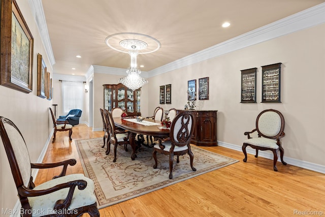 5626 Shadow Ln, Bloomfield Hills, MI 48302 - dining room with a chandelier, light wood-style flooring, crown molding, and recessed lighting