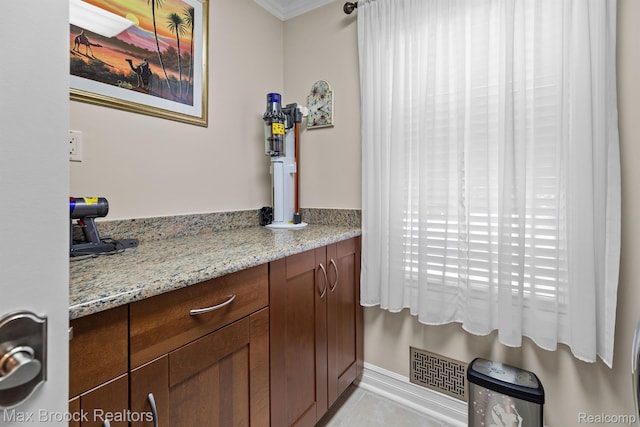 5626 Shadow Ln, Bloomfield Hills, MI 48302 - bathroom with crown molding and tile patterned floors