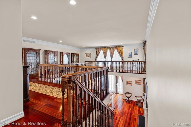 5626 Shadow Ln, Bloomfield Hills, MI 48302 - stairs with ornamental molding, wood finished floors, and recessed lighting