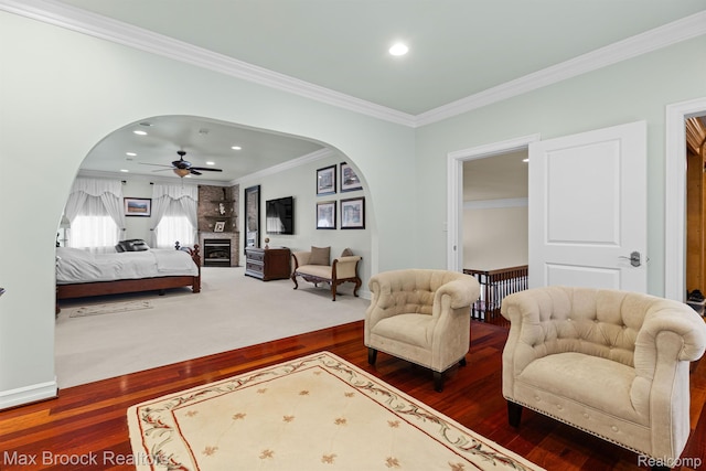 5626 Shadow Ln, Bloomfield Hills, MI 48302 - bedroom featuring arched walkways, crown molding, wood finished floors, recessed lighting, and a ceiling fan