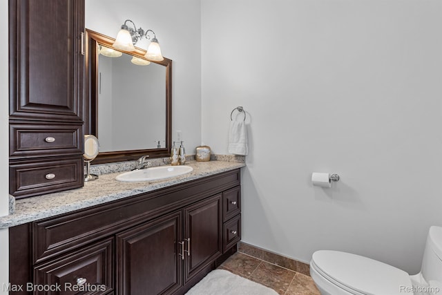 5626 Shadow Ln, Bloomfield Hills, MI 48302 - bathroom featuring toilet and vanity