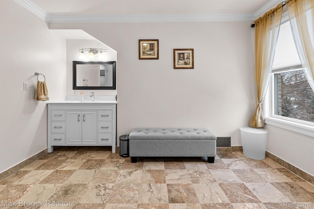 5626 Shadow Ln, Bloomfield Hills, MI 48302 - bathroom with stone tile flooring, vanity, and ornamental molding