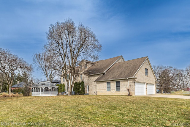 5626 Shadow Ln, Bloomfield Hills, MI 48302 - view of property exterior featuring a garage, a lawn, concrete driveway, a shingled roof, and brick siding
