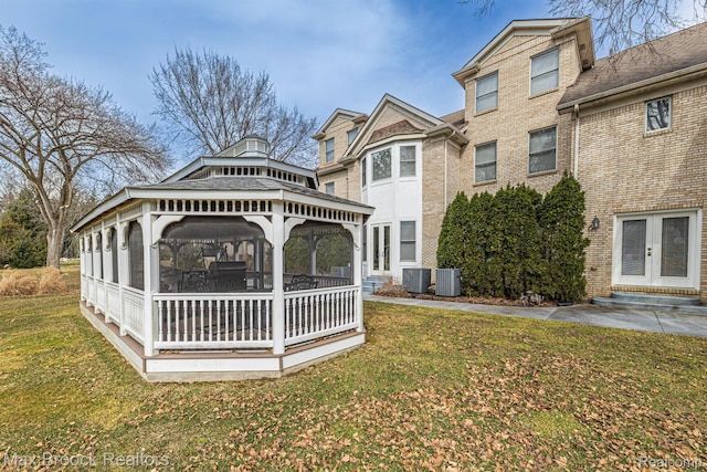 5626 Shadow Ln, Bloomfield Hills, MI 48302 - back of property featuring a gazebo, a lawn, and brick siding