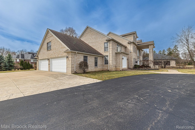 5626 Shadow Ln, Bloomfield Hills, MI 48302 - view of side of property featuring asphalt driveway and brick siding