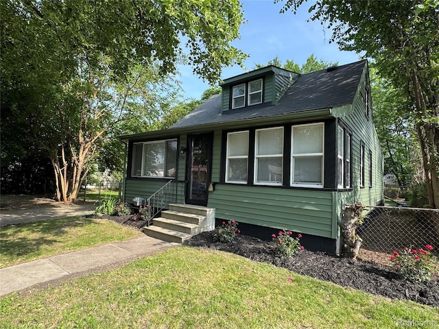 1741 Academy St, Ferndale, MI 48220 - bungalow-style home featuring entry steps and roof with shingles