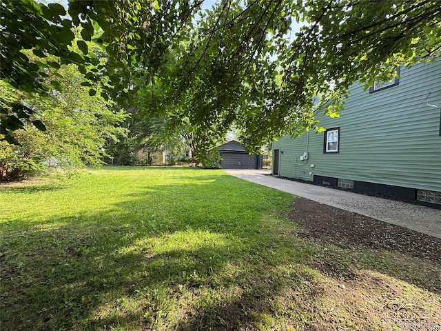 1741 Academy St, Ferndale, MI 48220 - view of green lawn with an outdoor structure