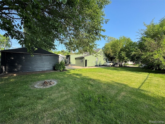 1741 Academy St, Ferndale, MI 48220 - view of grassy yard with a fire pit