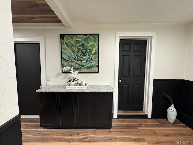 1741 Academy St, Ferndale, MI 48220 - bar featuring light wood-style floors and beam ceiling