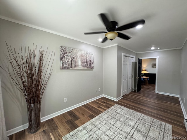 1741 Academy St, Ferndale, MI 48220 - empty room featuring a ceiling fan, dark wood-style flooring, ornamental molding, an office area, and recessed lighting