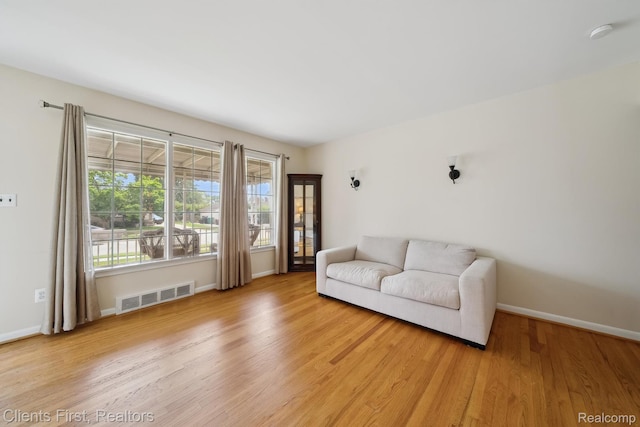 939 Deering St, Garden City, MI 48135 - living room featuring light wood-style floors and baseboards
