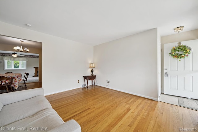 939 Deering St, Garden City, MI 48135 - living room with wood finished floors and a chandelier