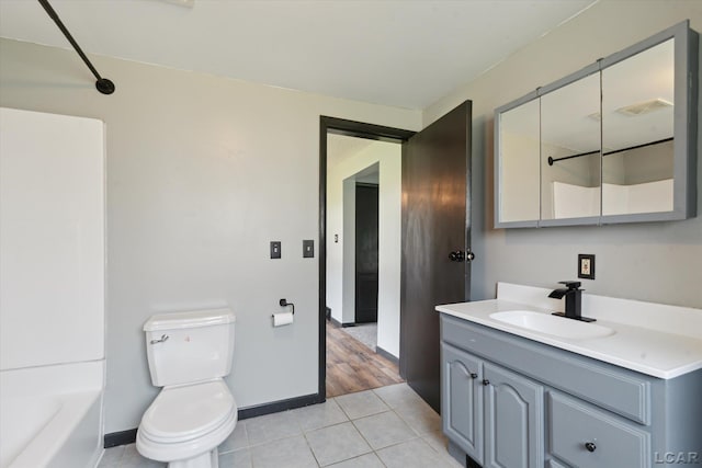 605 Oak St, Hudson, MI 49247 - bathroom featuring vanity, tile patterned floors, and shower / bath combination