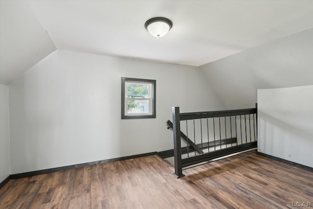 605 Oak St, Hudson, MI 49247 - bonus room featuring lofted ceiling and wood finished floors