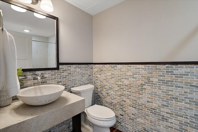 43 Campau Cir NW, Grand Rapids, MI 49503 - bathroom with tile walls and tasteful backsplash