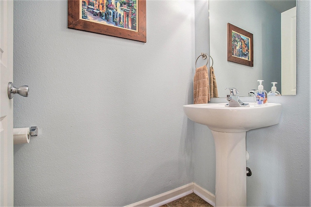 8855 Geiser Grv, Richland, MI 49083 - bathroom with baseboards and a sink