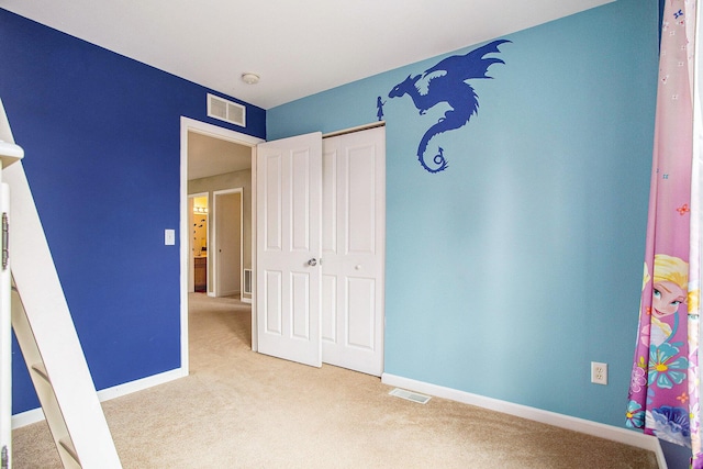 8855 Geiser Grv, Richland, MI 49083 - unfurnished bedroom featuring carpet and a closet