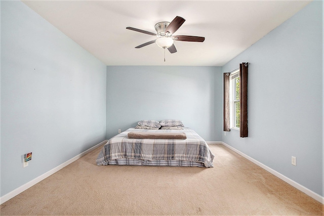 8855 Geiser Grv, Richland, MI 49083 - carpeted bedroom with baseboards and a ceiling fan