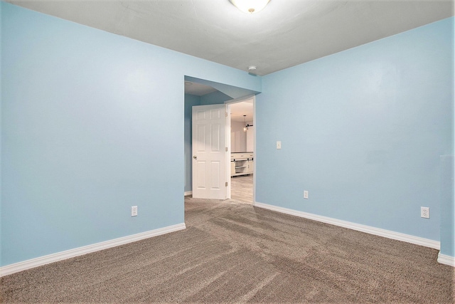 8855 Geiser Grv, Richland, MI 49083 - unfurnished room featuring carpet and baseboards