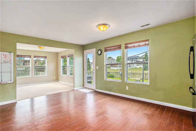8855 Geiser Grv, Richland, MI 49083 - spare room with wood finished floors