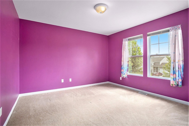 8855 Geiser Grv, Richland, MI 49083 - carpeted spare room with baseboards