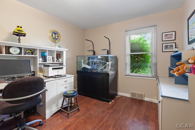 1043 Orchard Rd, Adrian, MI 49221 - office with dark wood-style flooring and baseboards
