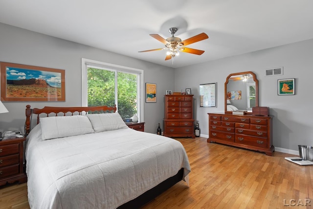 1043 Orchard Rd, Adrian, MI 49221 - bedroom featuring light wood-style floors and ceiling fan