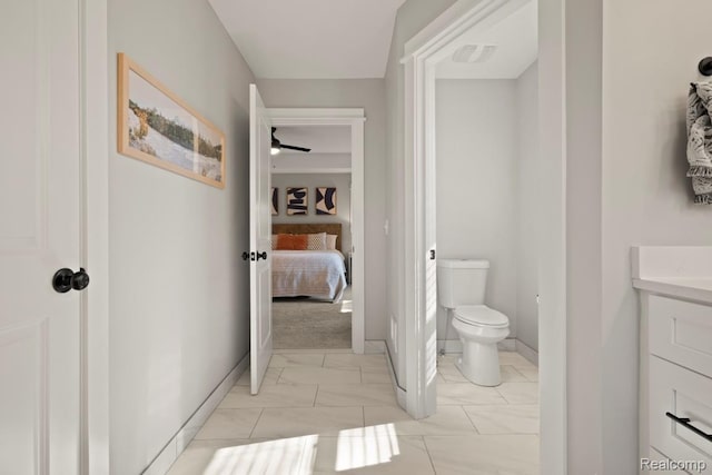 423 N Altadena Ave, Royal Oak, MI 48067 - bathroom with marble look tiles, vanity, and ensuite bath