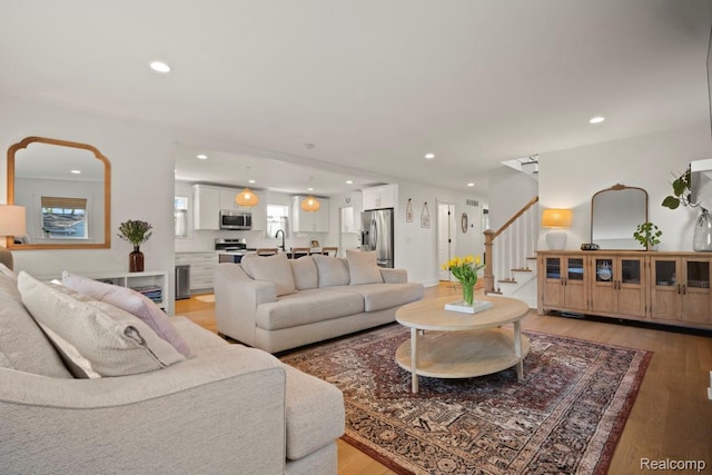 423 N Altadena Ave, Royal Oak, MI 48067 - living area with recessed lighting, light wood-style flooring, and stairway