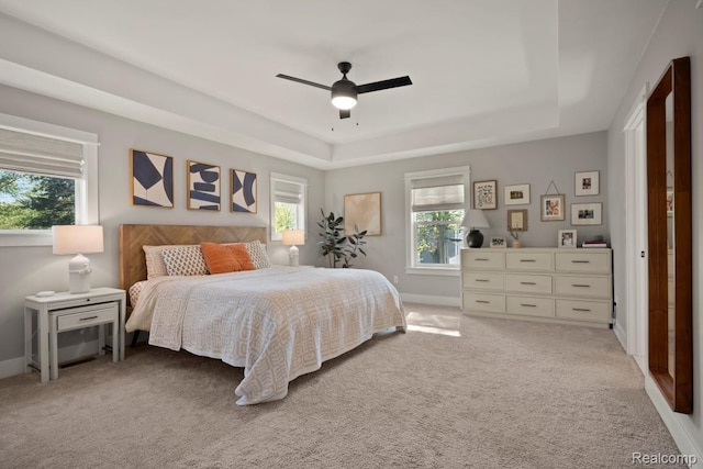 423 N Altadena Ave, Royal Oak, MI 48067 - bedroom with a tray ceiling, light carpet, and ceiling fan