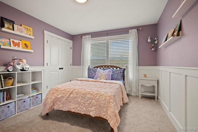423 N Altadena Ave, Royal Oak, MI 48067 - bedroom featuring carpet floors, wainscoting, a closet, and a decorative wall