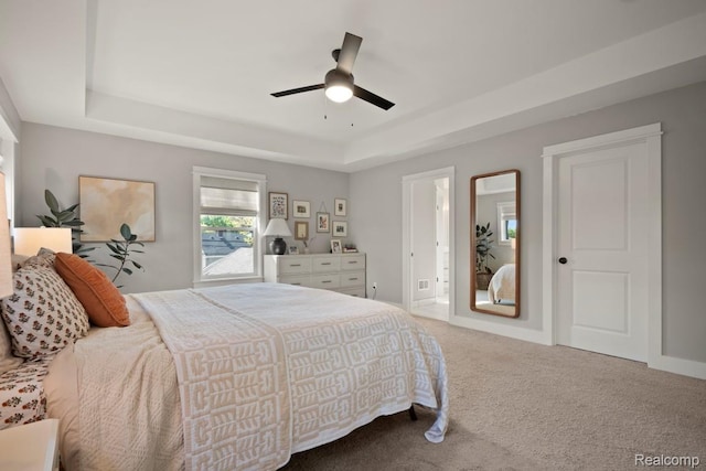 423 N Altadena Ave, Royal Oak, MI 48067 - bedroom with a raised ceiling, carpet flooring, connected bathroom, and a ceiling fan