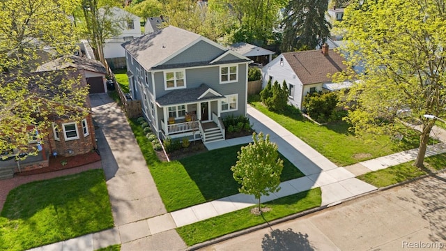 423 N Altadena Ave, Royal Oak, MI 48067 - view of front of property with a porch, a front lawn, roof with shingles, and a residential view