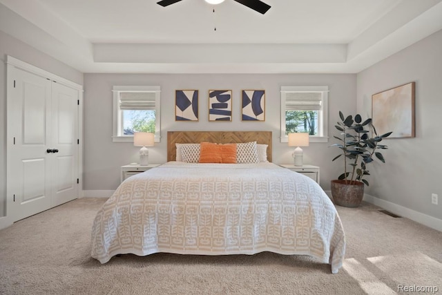 423 N Altadena Ave, Royal Oak, MI 48067 - carpeted bedroom with multiple windows, a raised ceiling, and ceiling fan