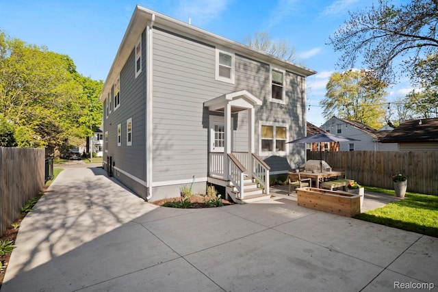 423 N Altadena Ave, Royal Oak, MI 48067 - rear view of house featuring a patio area