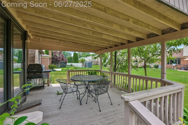 42471 Arcadia Dr, Sterling Heights, MI 48313 - wooden terrace with outdoor dining area, a yard, and a grill